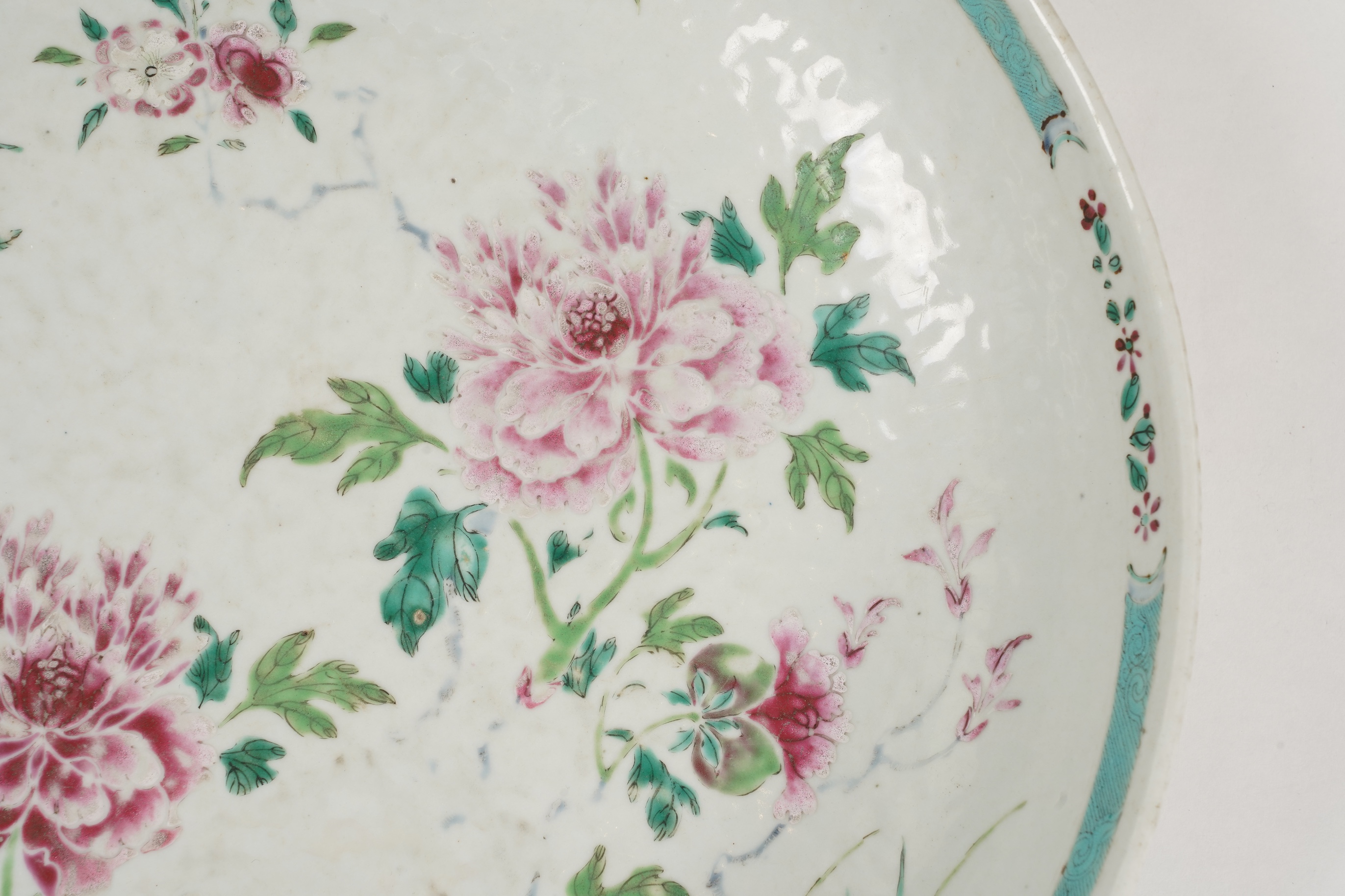 A Chinese export famille rose deep dish, underglaze blue Xuande mark but 18th century